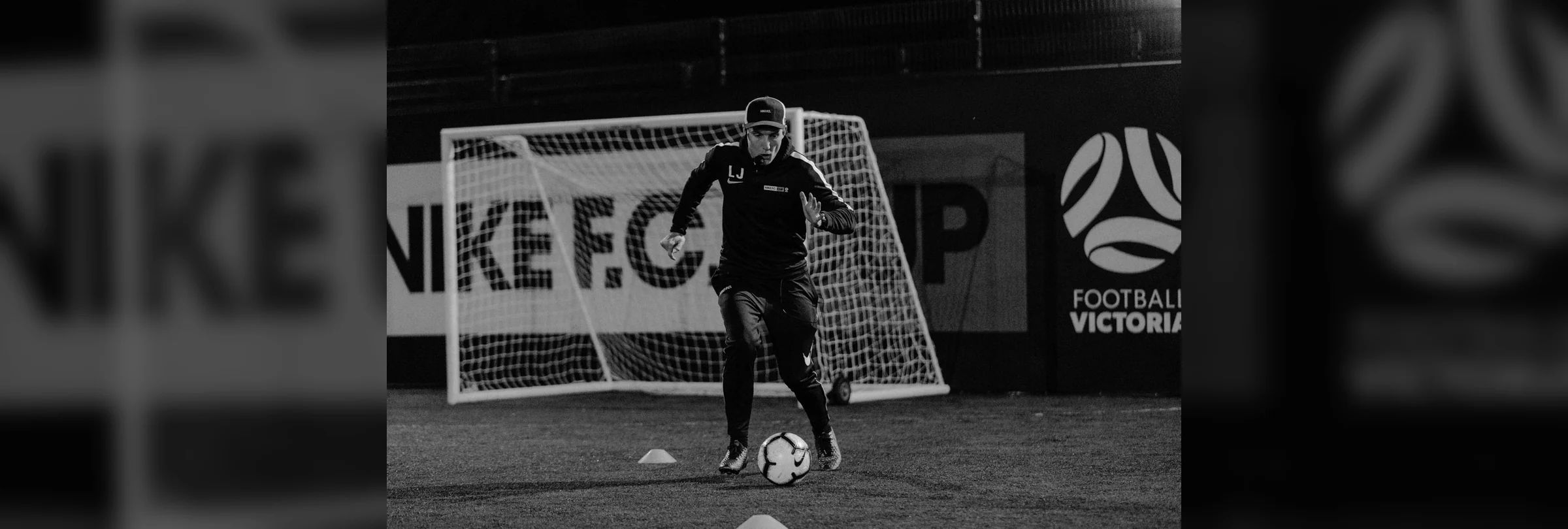 Lee Jones coaching on the pitch at Joner Football